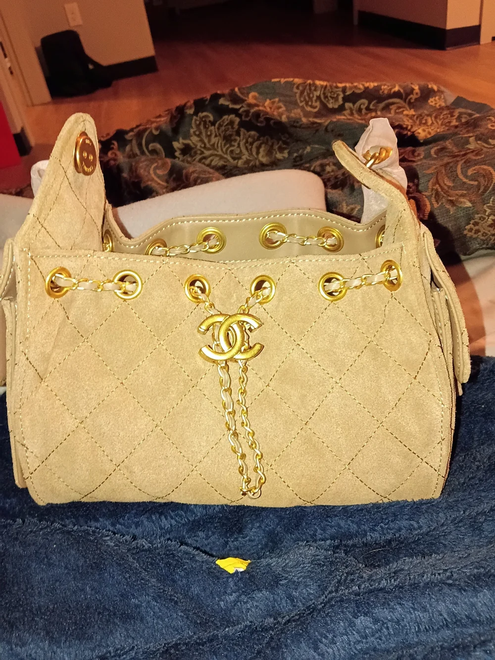 CHANEL Beige Quilted Suede Drawstring Shoulder Bag with Gold Hardware